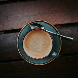 High angle view of coffee cup on table