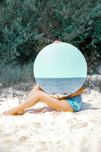 Woman relaxing on beach