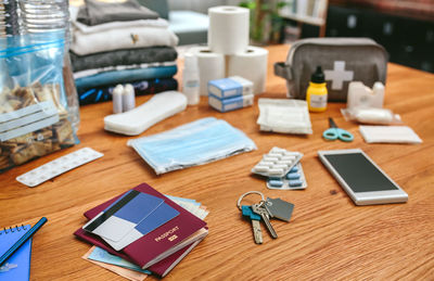 Emergency backpack equipment organized on the table