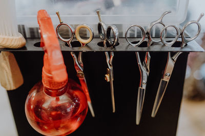 Close-up of objects on table at rack