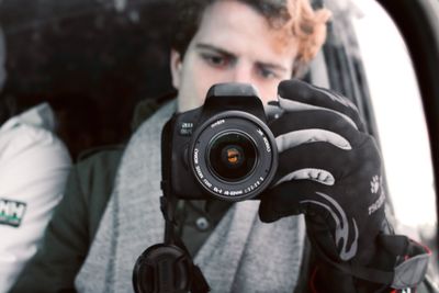 Portrait of man photographing