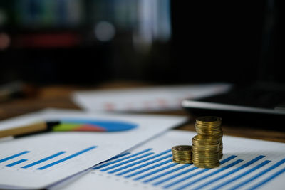 Close-up of coins on table