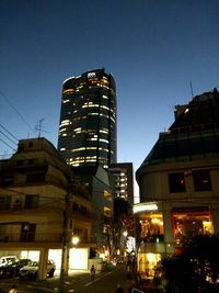 Low angle view of modern buildings against sky