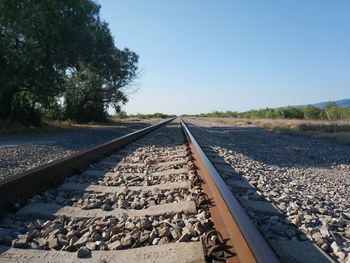 View of railroad tracks against clear sky