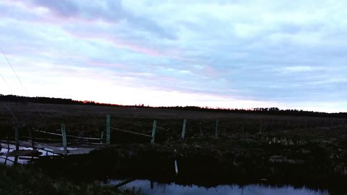 Scenic view of landscape at sunset