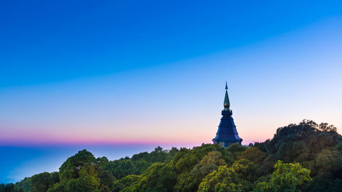 Pagoda on mountain against clear sky at doi inthanon national park 