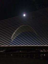 Low angle view of moon in the dark