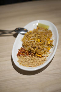 Close-up of noodles in bowl on table