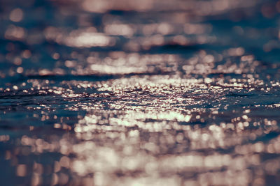 Full frame shot of pebbles in water