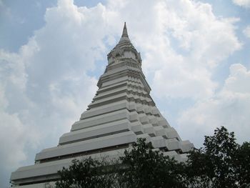 Low angle view of historical building against cloudy sky