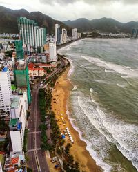 High angle view of beach by buildings in city