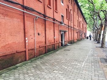 Narrow alley along buildings