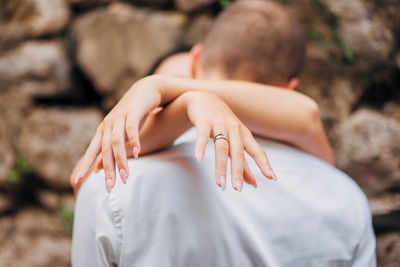 Midsection of woman holding hands