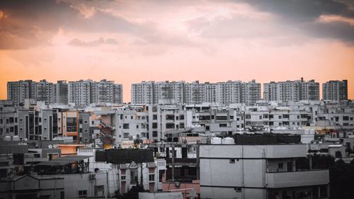 High angle view of buildings in city against sky