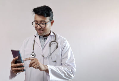 Young man using mobile phone