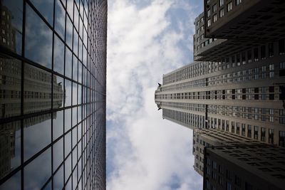 Low angle view of skyscrapers against sky