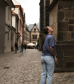 Rear view of man walking on street