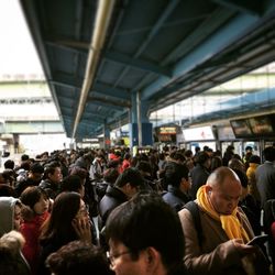 People at railroad station