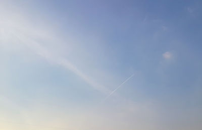 Low angle view of vapor trail in sky