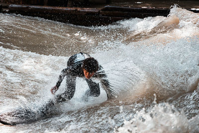 Man swimming in sea
