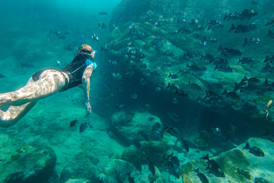 Full length of woman swimming in sea