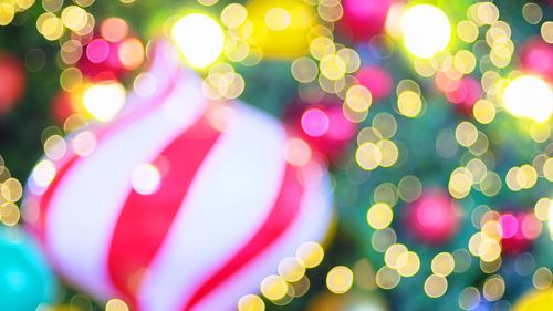 Defocused image of illuminated christmas tree