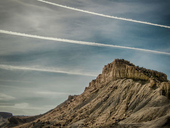 Low angle view of vapor trail against sky