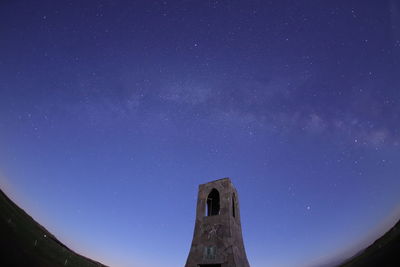 Low angle view of stars against sky at night