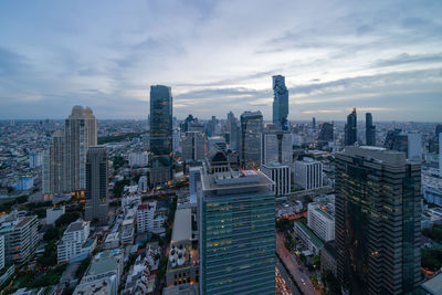 High angle view of buildings in city against sky