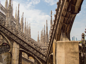 Low angle view of milan cathedral against sky