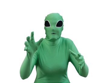 Person wearing green costume standing against white background