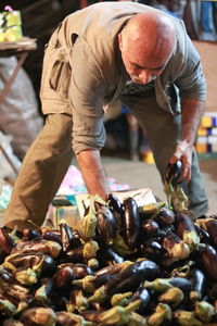 Man selling vegetable at market