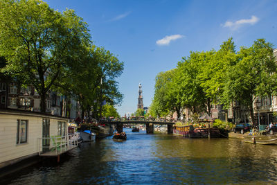 Boats moored in river