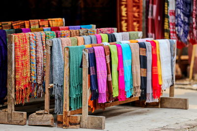 Close-up of multi colored scarves for sale at market