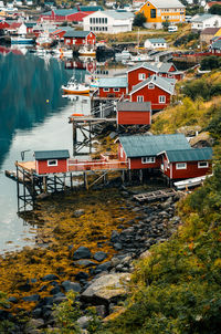 Scenic view of norwegian houses on stilts in reine. ideal for travel and architectural projects.