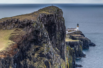 Scenic view of sea against mountain