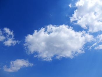 Low angle view of clouds in blue sky