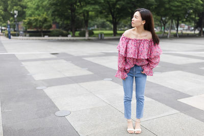 Full length of woman standing outdoors