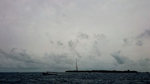 Sailboat sailing in sea