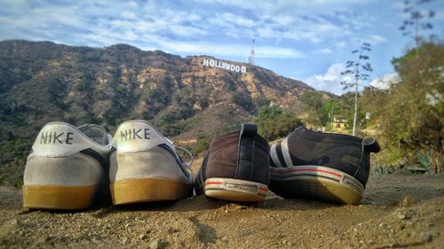 High angle view of shoes on sand