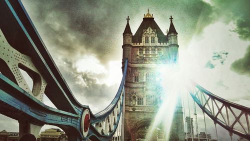 Low angle view of built structure against cloudy sky