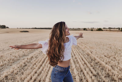 Woman standing in a field