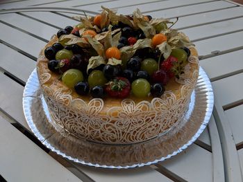 High angle view of fruits in plate on table