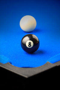 Close-up of blue ball on table