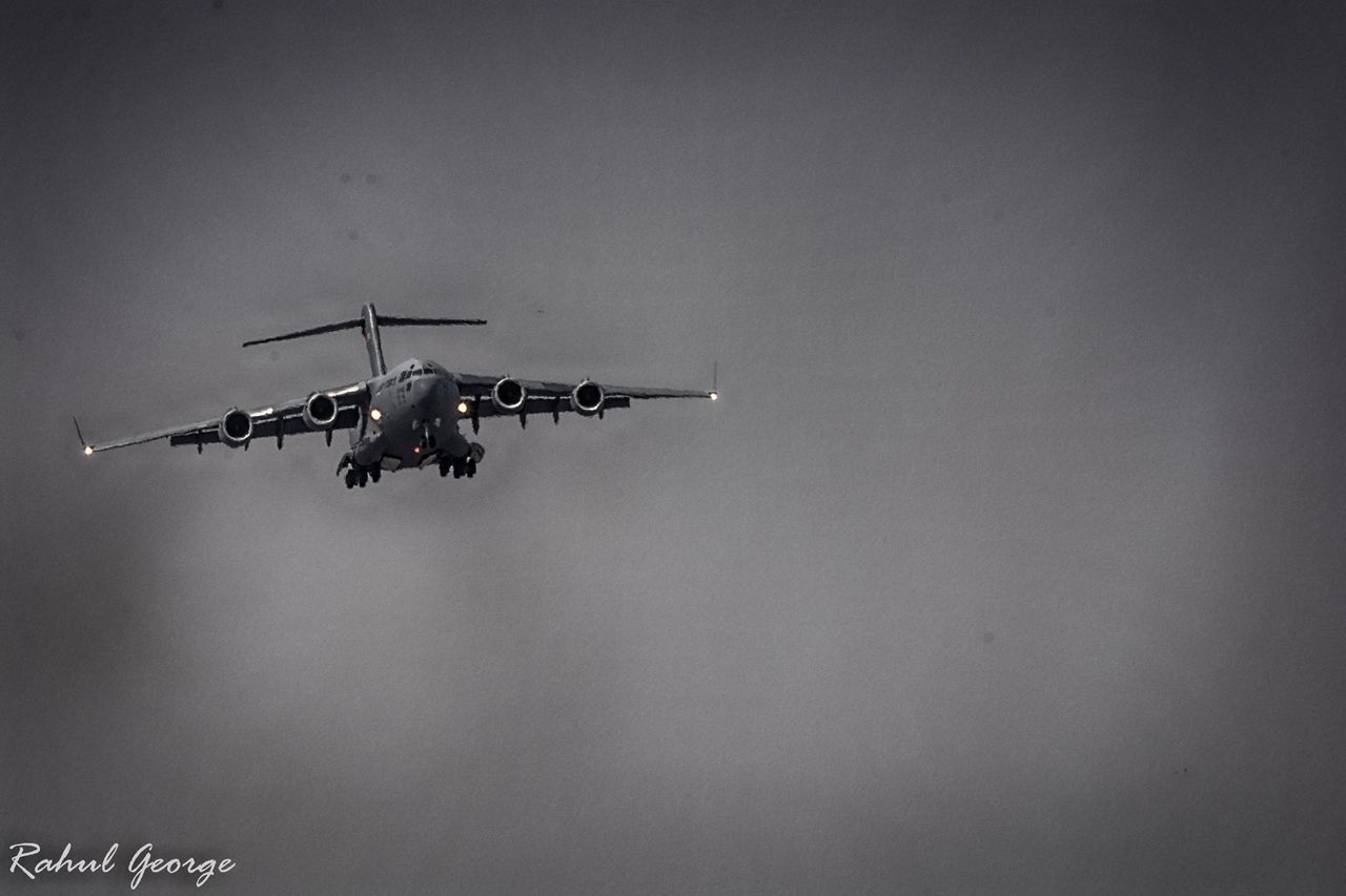 LOW ANGLE VIEW OF HELICOPTER IN SKY