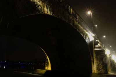 Illuminated street light at night