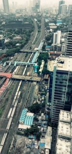 High angle view of street amidst buildings in city