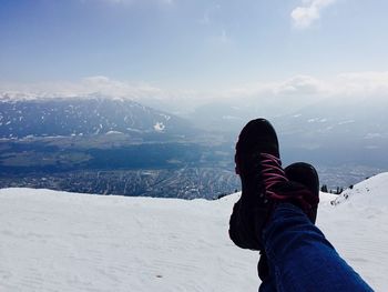 Scenic view of snow covered mountain against sky