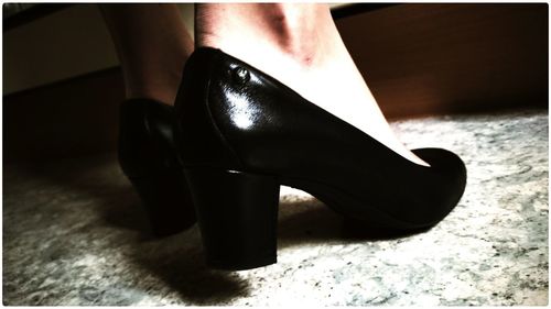 Close-up of shoe on floor