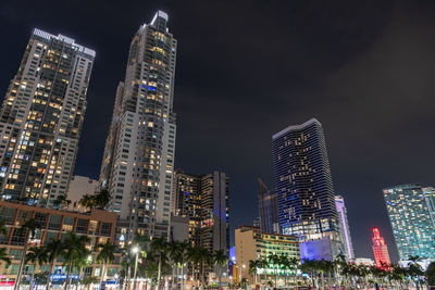 Illuminated buildings in city at night